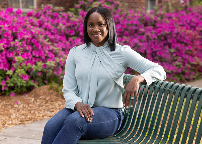 Janice sitting on a bench